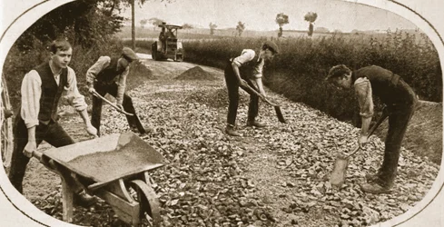 Conscientious Objectors usefully employed: Men of the N.C.C. on a military road, illustration from 